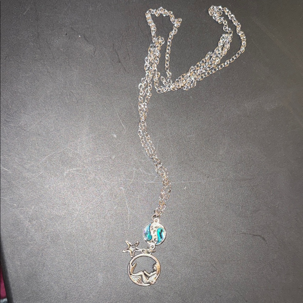 Silver toned and Blue Star Pendant Necklace